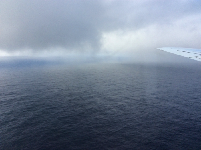 The leading edge of the SPCZ. The DC-8 sampled down to 500 feet over the ocean at the northern edge of the SPCZ, finding a view more likely to be seen from a boat than a jet aircraft. With stormy weather ahead, we took our samples quickly and climbed as high as we could. Even at the ceiling of the DC-8's altitude, we still encountered rough flying conditions. Steven Wofsy, Harvard University
