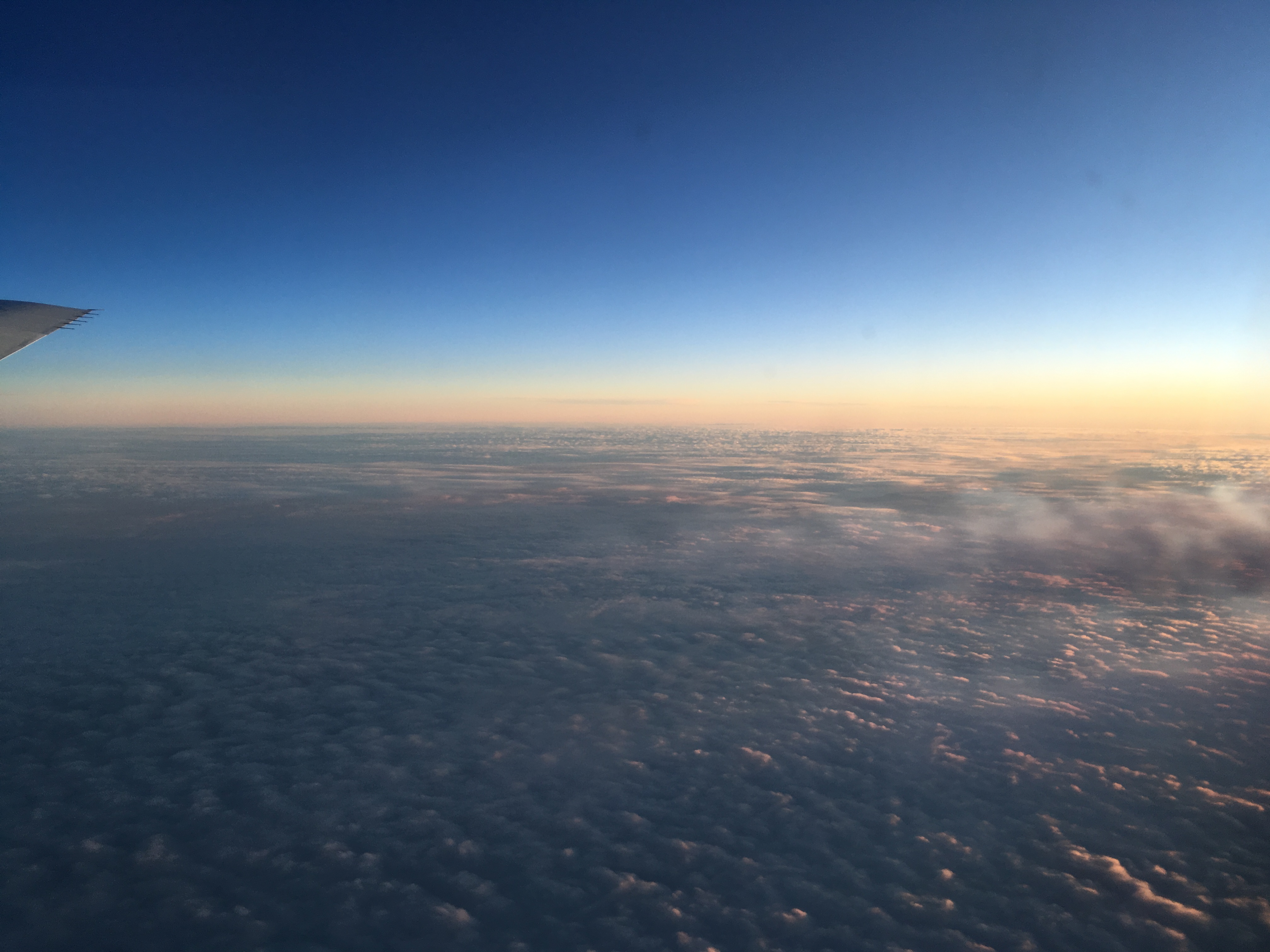 Watching the sun set mid-way through our flight from New Zealand to Punta Arenas, Chile. Credit: Róisín Commane