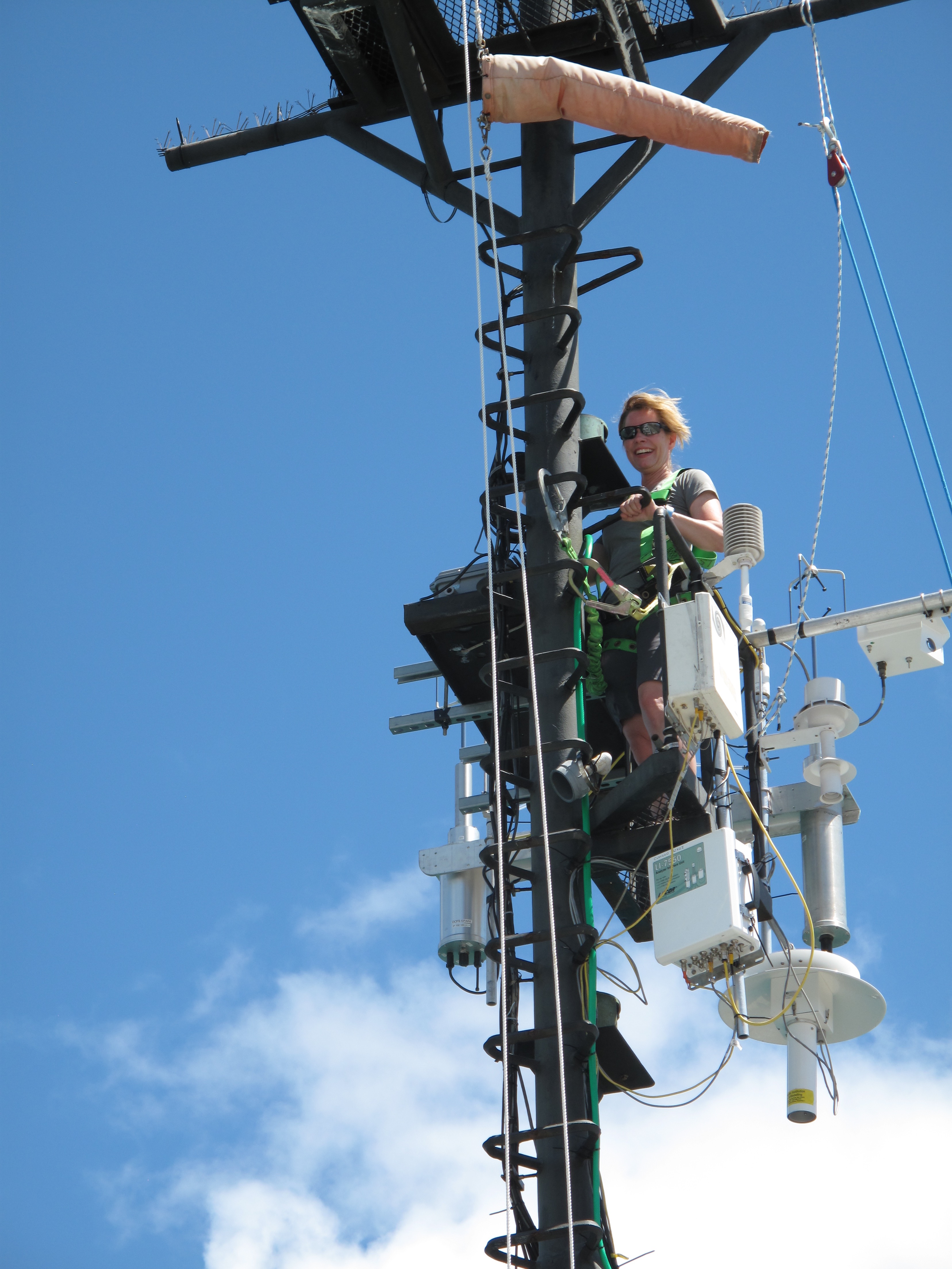 Carol Anne Clayson at work on the bow mast.