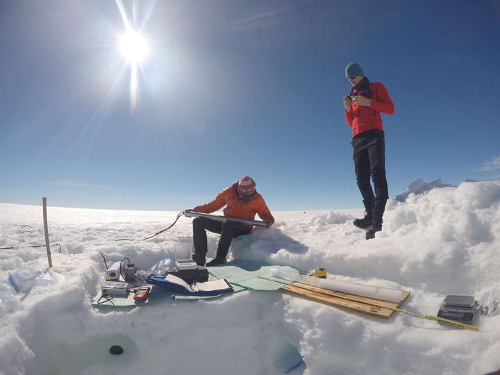 Clem and Stefan studying an ice core.