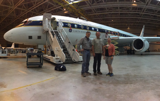 Steve Wofsy (ATom PI), Bruce Daube and Róisín Commane with the DC-8 in a nice and cool hanger in Palmdale, CA. Credit: