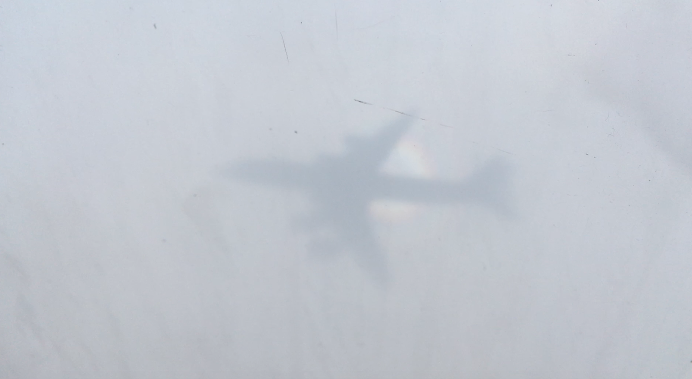The shadow of the DC-8 on clouds below, haloed by a "glory". Róisín Commane