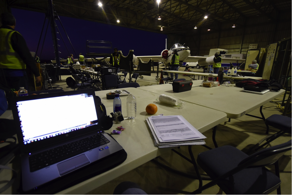 Last-second admin before suiting up. Credit: Stu Broce