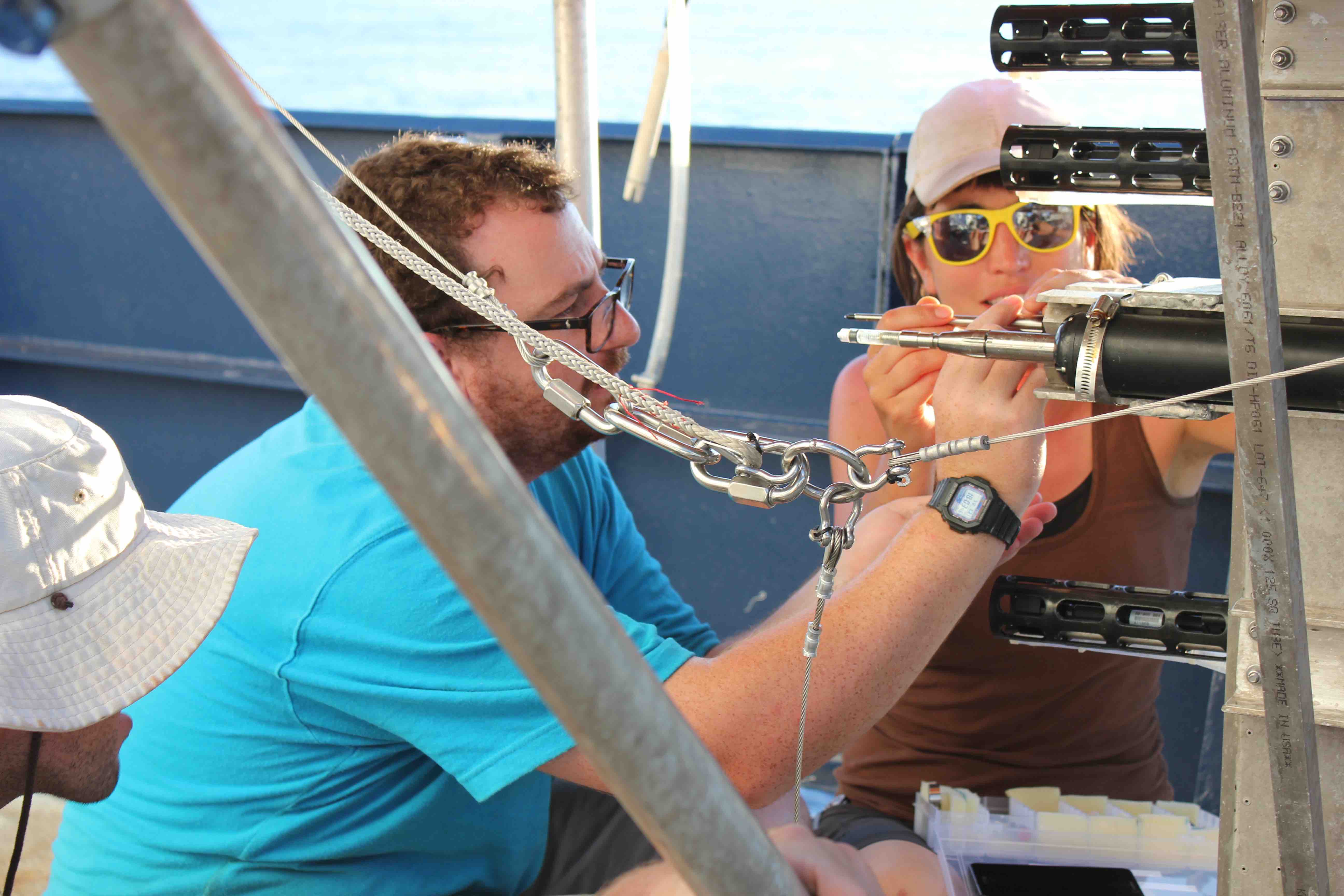 Dan Clark and Kyla Drushka of APL make final adjustments of the SSP microstructure probes.