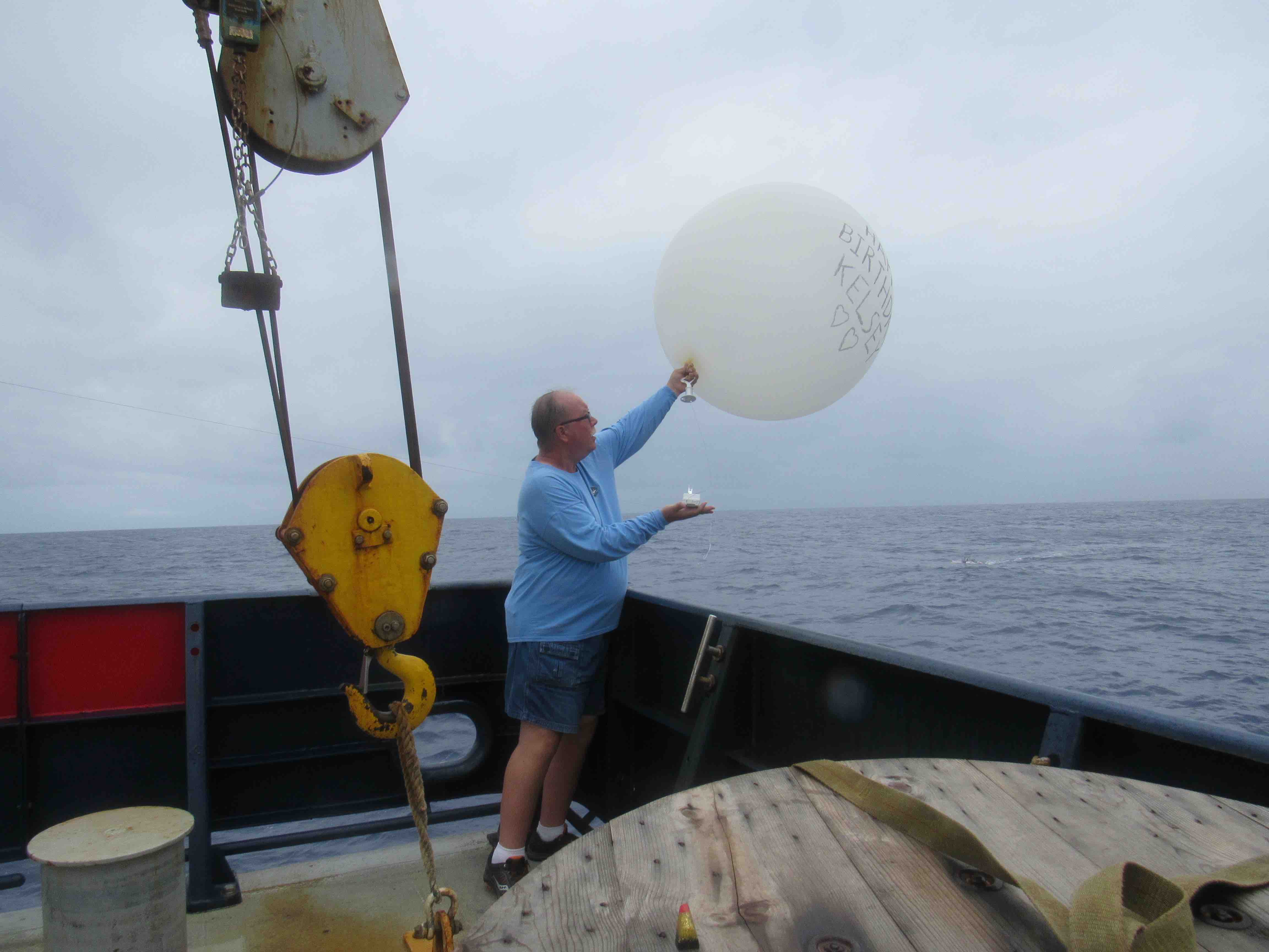 Kelsey's balloon, floating away.