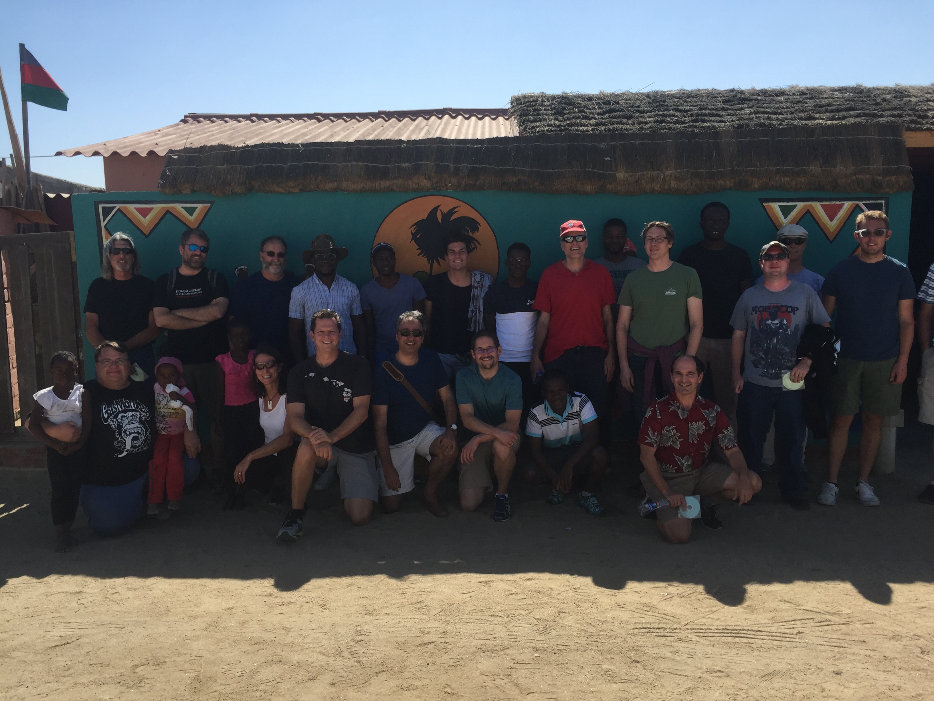 A group of hungry scientists outside Hafeni Restaurant in the Mondesa neighborhood of Swakopmund. Credit: restaurant staff