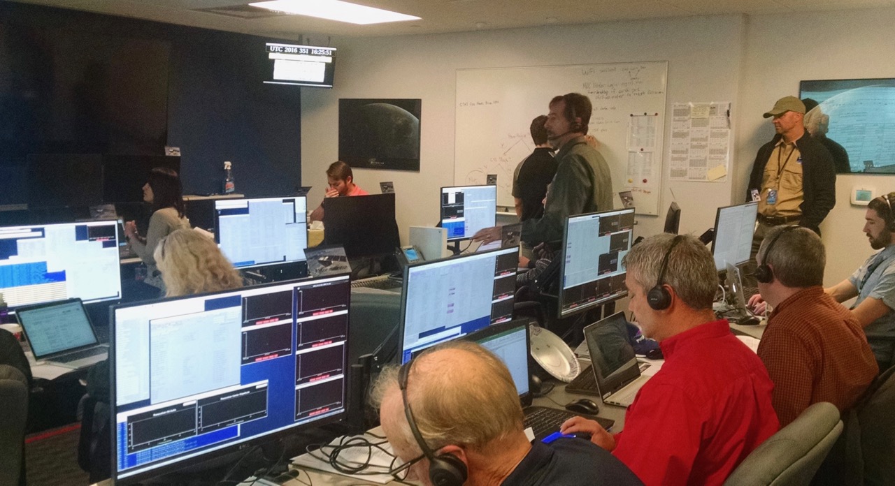 The MOC team hard at work pouring over initial engineering data from the spacecraft on December 16, 2016. Photo credit: Chris Ruf