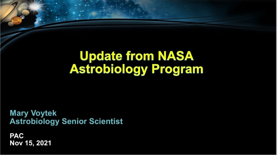 title slide with yellow text on black background with small image at upper left of silhouette with planets as hair crown