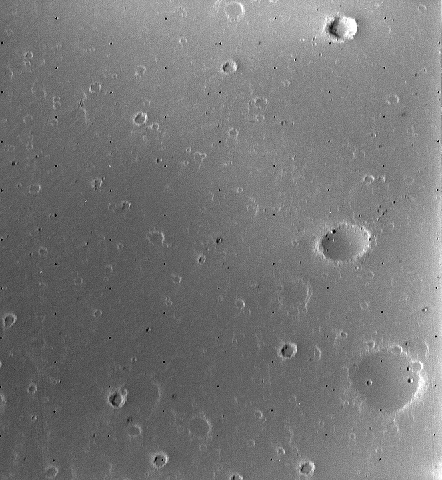 Craters on Martian Moon Deimos. Most of the surface is smoothed by dust.