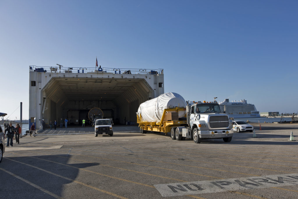 The United Launch Alliance Atlas V booster and Centaur stage for NOAA's Geostationary Operational Environmental Satellite-S (GOES-S) are offloaded from the Mariner transport ship at the Army Wharf at Cape Canaveral Air Force Station in Florida.