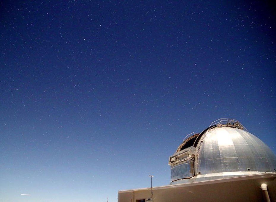 Domed telescope with the night sky above