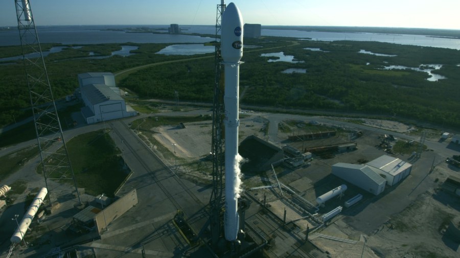The SpaceX Falcon 9 rocket set to launch NASA's TESS spacecraft stands at Space Launch Complex 40 on Cape Canaveral Air Force Station. The SpaceX Falcon 9 rocket set to launch NASA's TESS spacecraft stands at Space Launch Complex 40 on Cape Canaveral Air Force Station.
