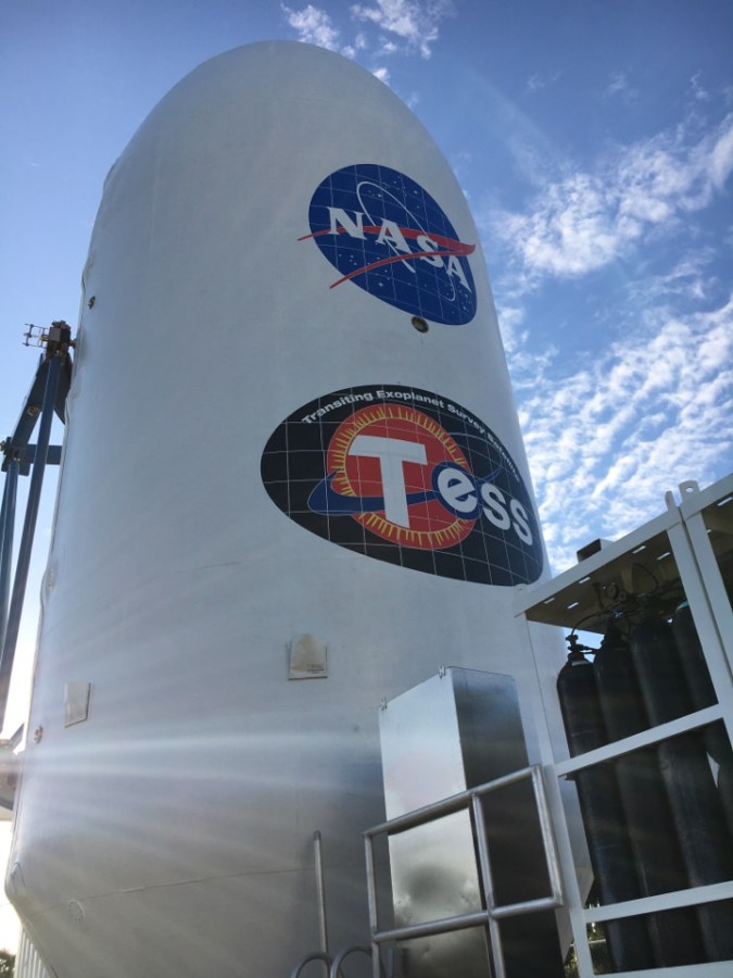 The payload fairing for NASA's Transiting Exoplanet Survey Satellite (TESS) is being moved to the Payload Hazardous Servicing Facility at the agency's Kennedy Space Center in Florida. Inside the facility, TESS will be encapsulated in the payload fairing.