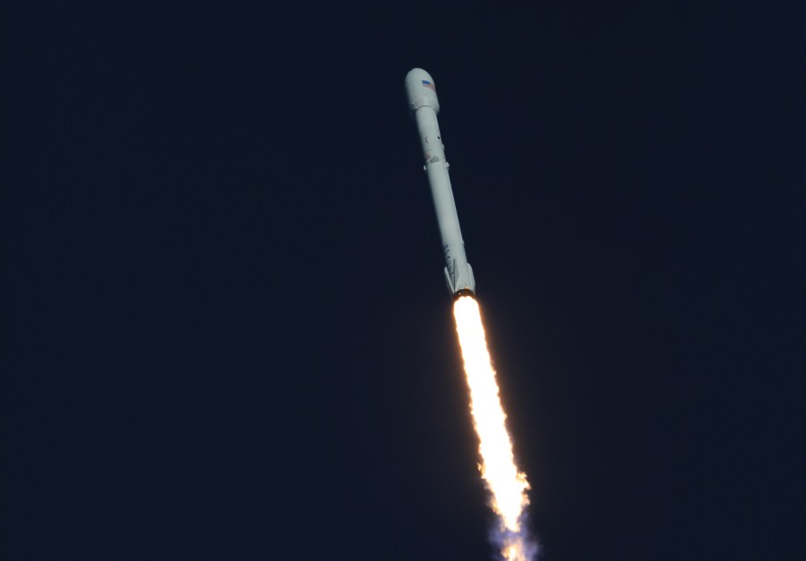 A SpaceX Falcon 9 rocket soars upward after lifting off from Space Launch Complex 40 at Cape Canaveral Air Force Station in Florida, carrying NASA's Transiting Exoplanet Survey Satellite (TESS). Liftoff was at 6:51 p.m. EDT.