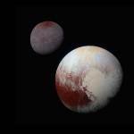 A composite image with Pluto's moon, Charon behind Pluto. Both worlds appear reddish with tan features in this enhanced color image.