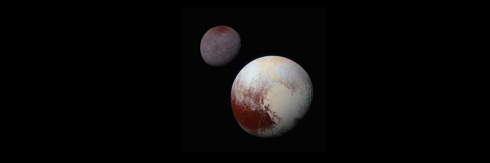 A composite image with Pluto's moon, Charon behind Pluto. Both worlds appear reddish with tan features in this enhanced color image.