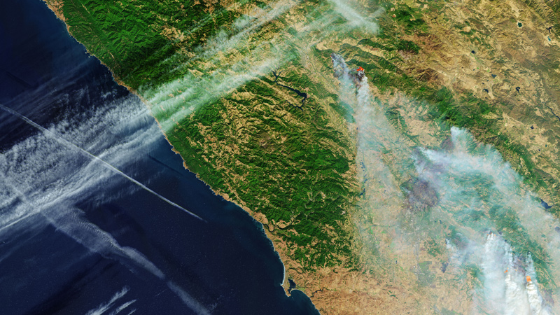 Satellite view of smoke and hot spots.