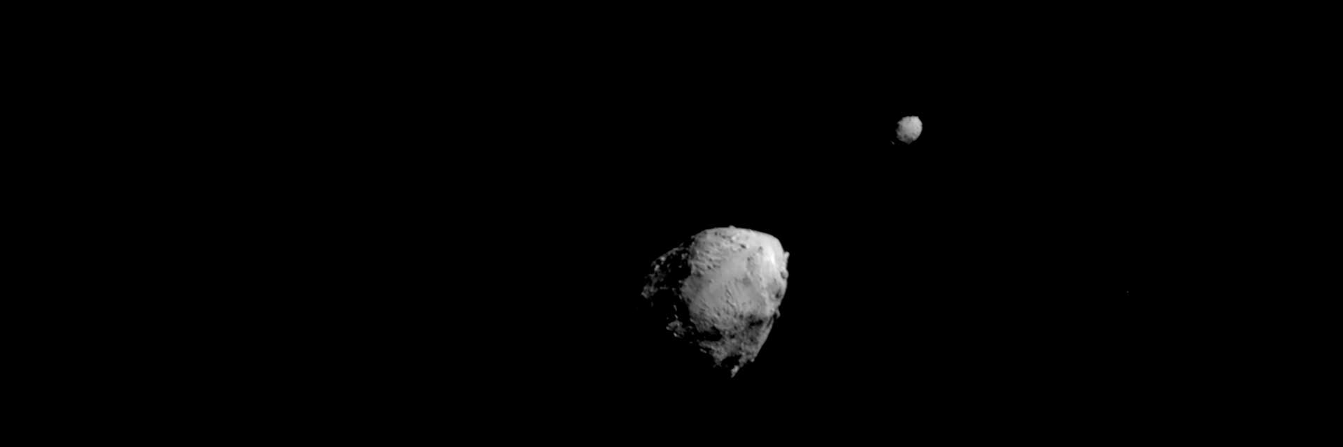 Two asteroids in space