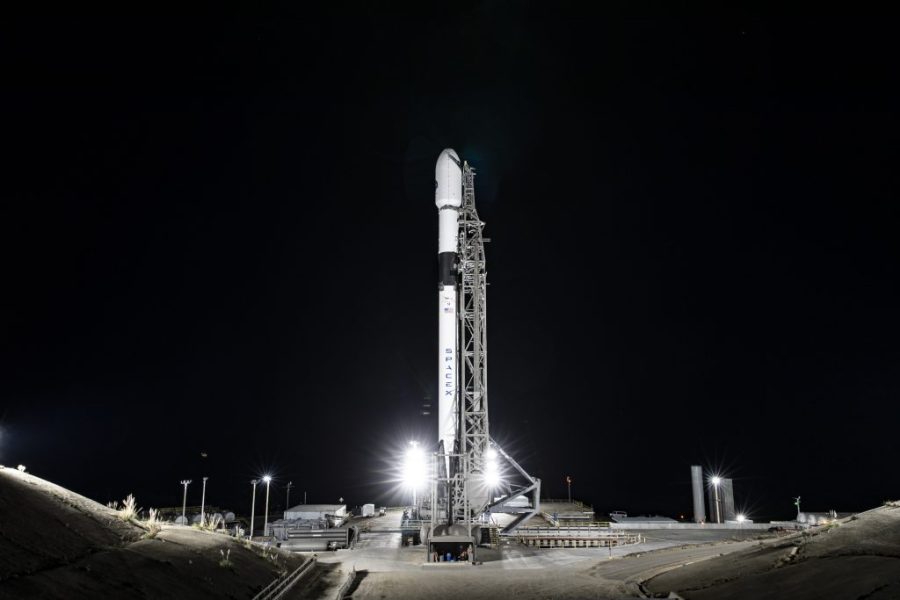A SpaceX Falcon 9 rocket with Sentinel-6 Michael Freilich in its payload fairing is vertical at the launch pad.