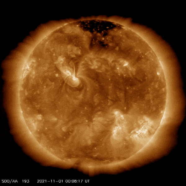 animated image of the Sun showing three small flares