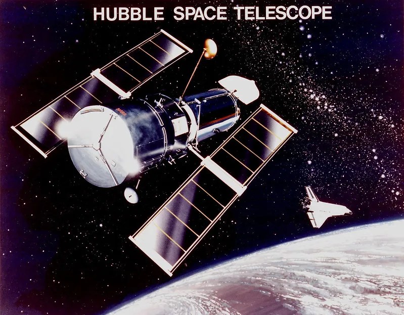 Illustration of Hubble being deployed in space from a space shuttle orbiting Earth.