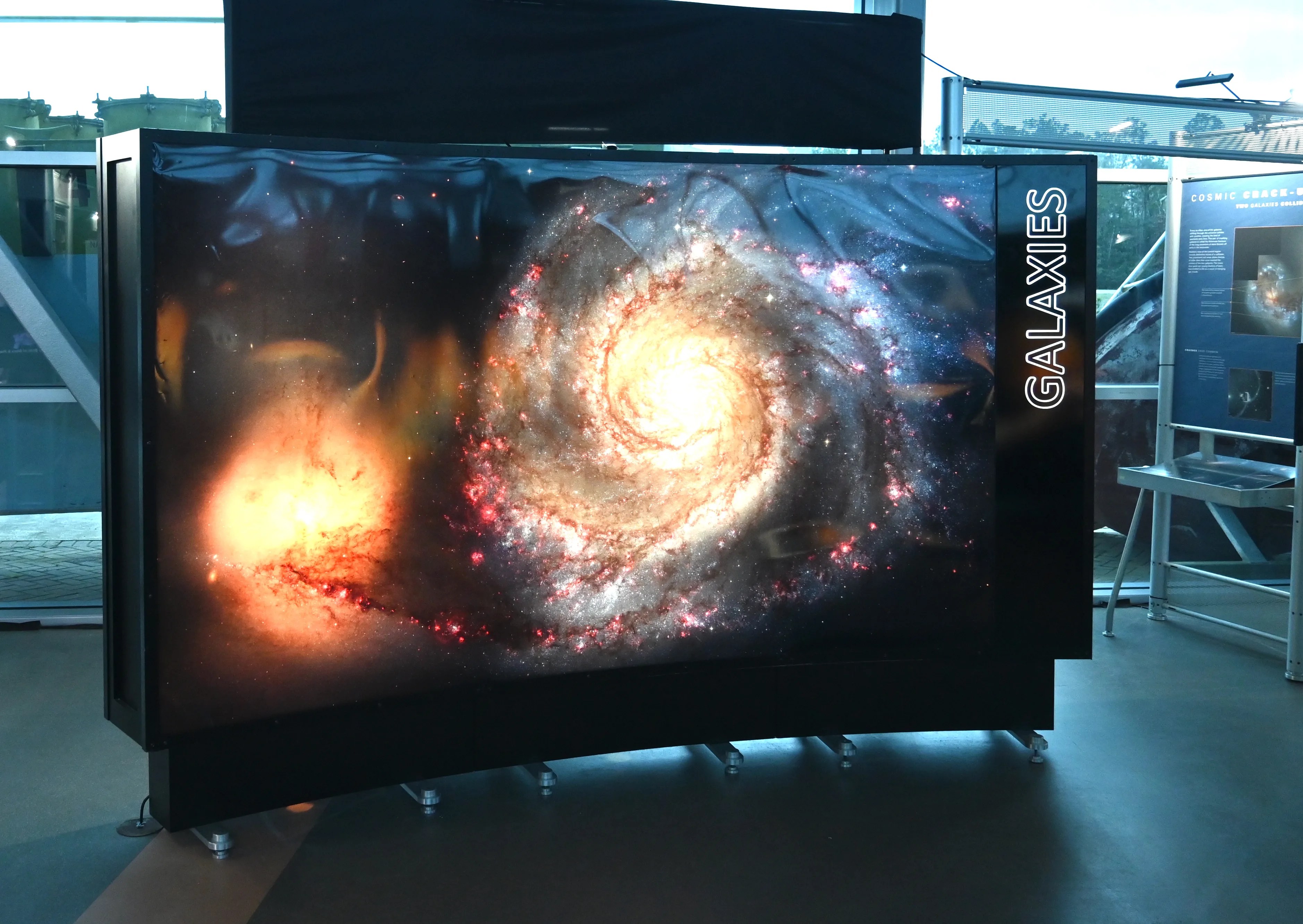 An 11 foot by 6 foot backlit image of the Whirlpool Galaxy