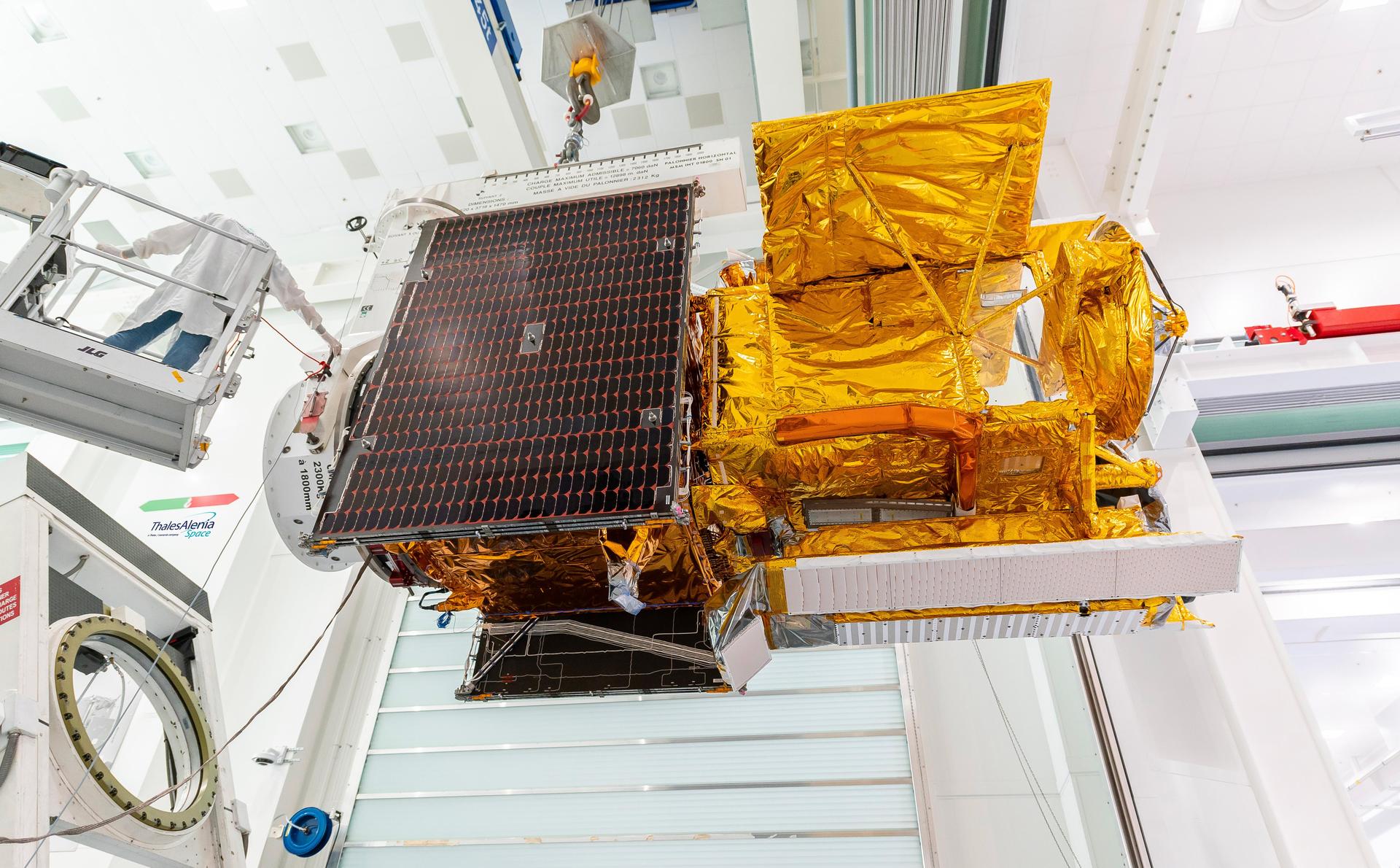 The Surface Water and Ocean Topography (SWOT) satellite is loaded into a container in Cannes, France, in preparation for its transportation to the United States.