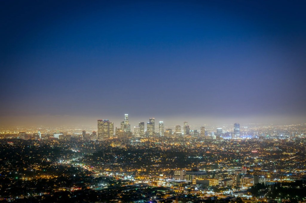 City lights on a dark night showing light pollution.