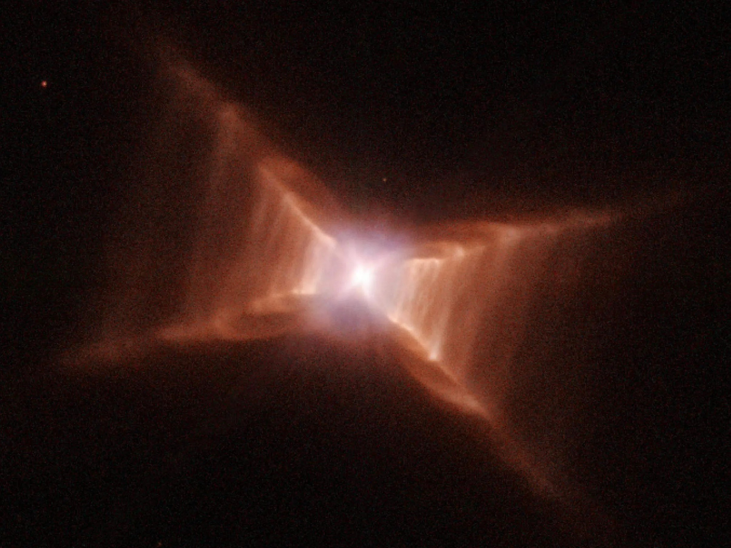 Dying star sculpts rungs of gas and dust