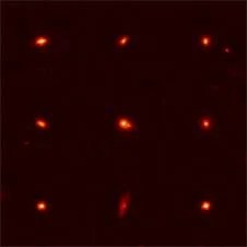 Hubble image of compact galaxies from 11 billion years ago.