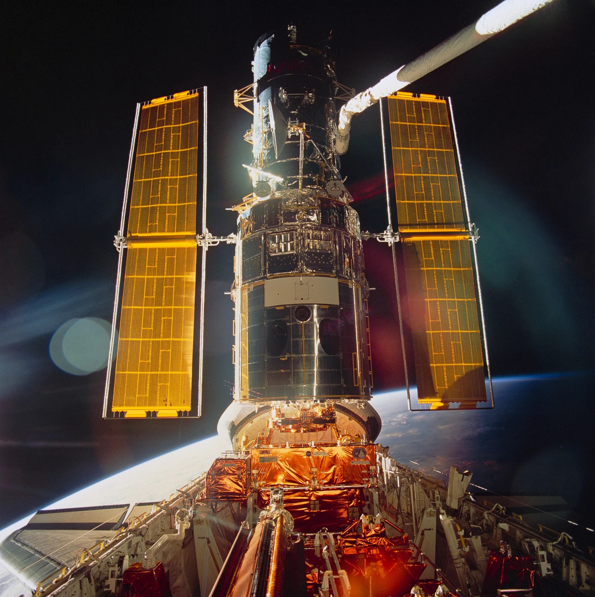 spacecraft in orbit over the Earth