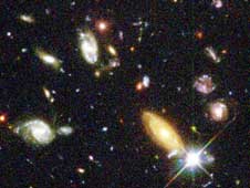 Hubble helped find the first evidence that the universe's expansion is not slowing down, as expected, but speeding up by an unknown force - dark energy.