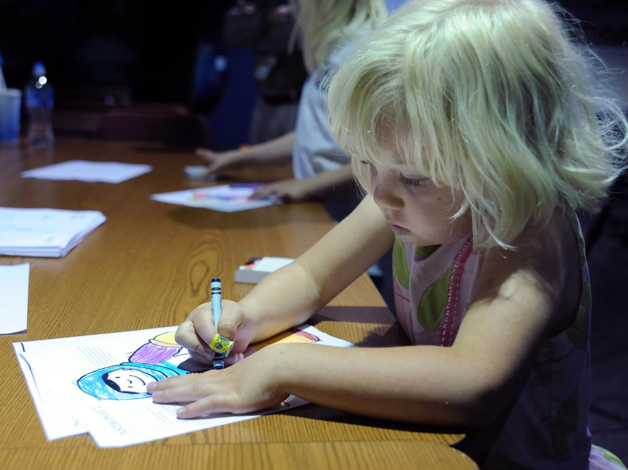 girl with coloring book