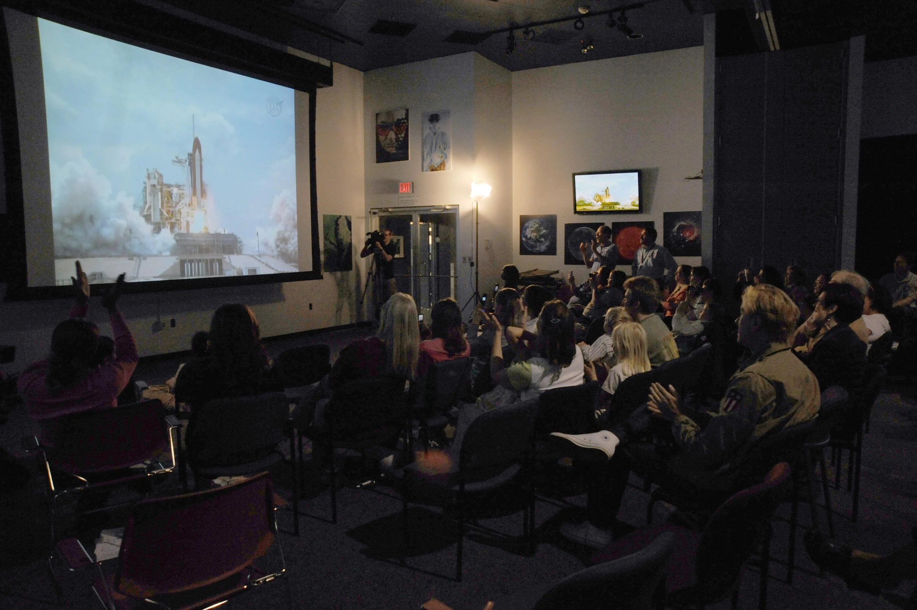 Crowd at the Goddard Visitor Center watches the Atlantis launch.