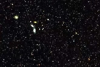 
			NASA - Hubble Goes 'Deep' to Sample Young Galaxies			