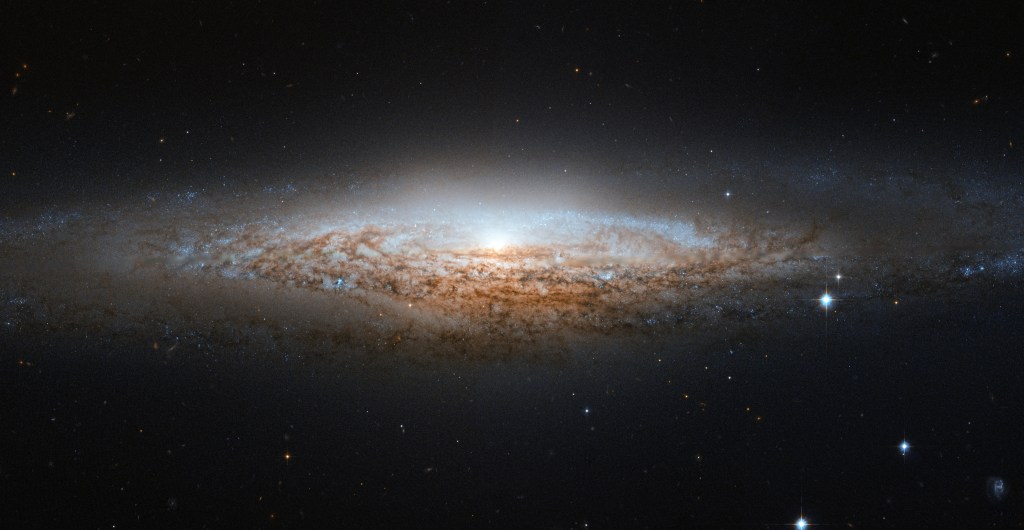 
			Hubble Spies a Spiral Galaxy Edge-on - NASA Science			