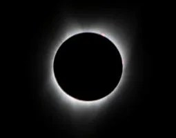 During the 2017 total solar eclipse, the sun’s corona, only visible during the total eclipse, is shown as a crown of white flares from the surface.