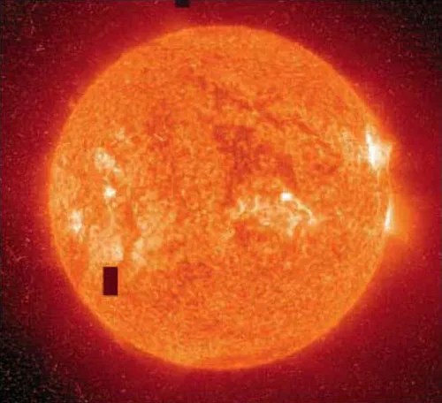 Image of an oragne sun with a solar flare shooting out.