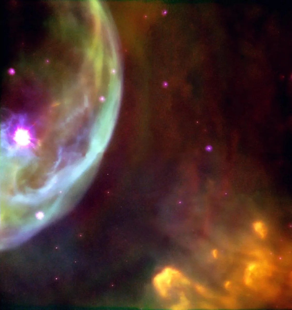 On the top left of the image, light blue dust and gas surrounds a purple star. At the bottom right, delicate filaments of dust.