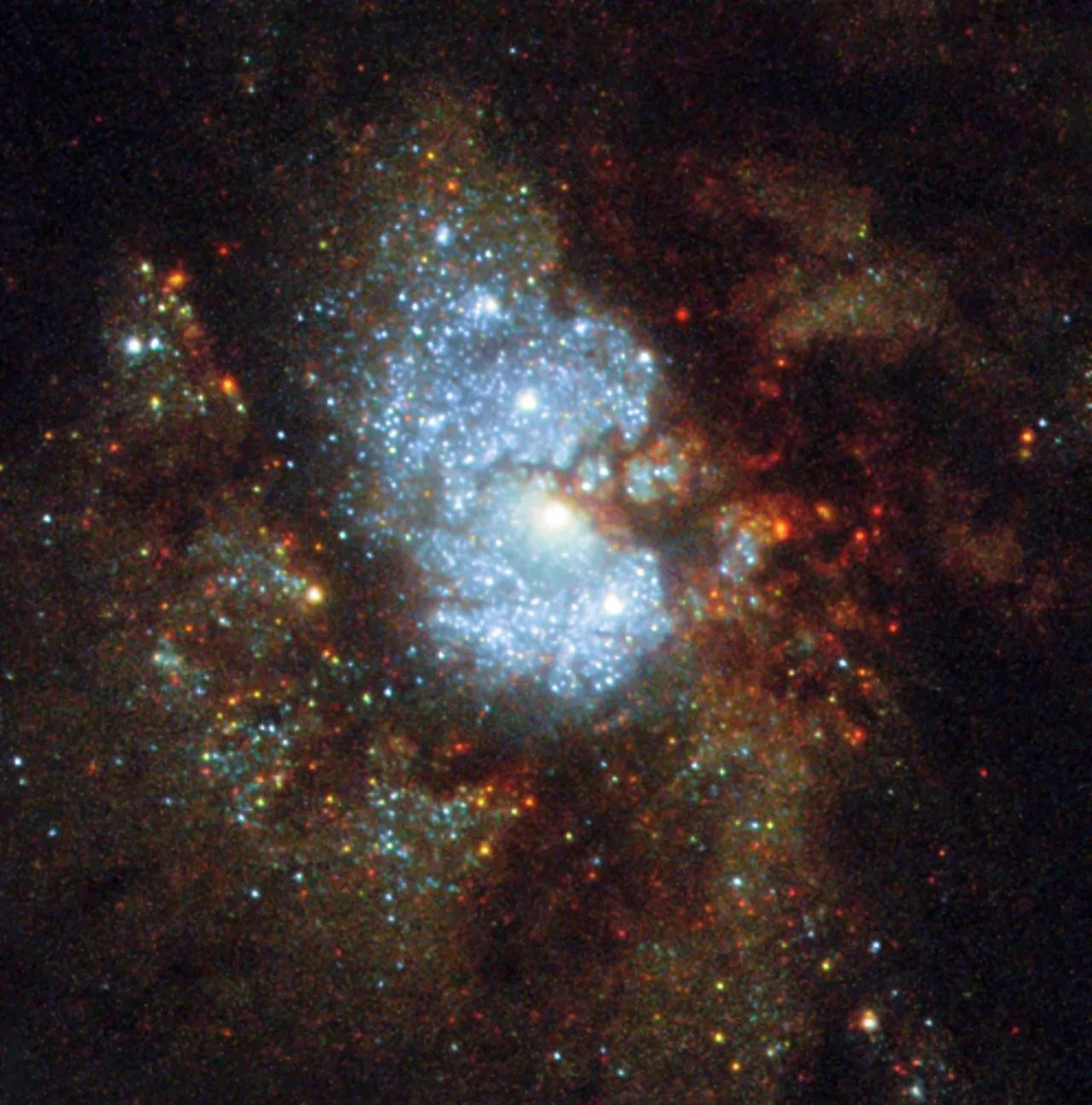 Bright central region with many bright, white stars creating a glowing section of dust and gas. Around that center there are darker clouds of dark orange with stars.
