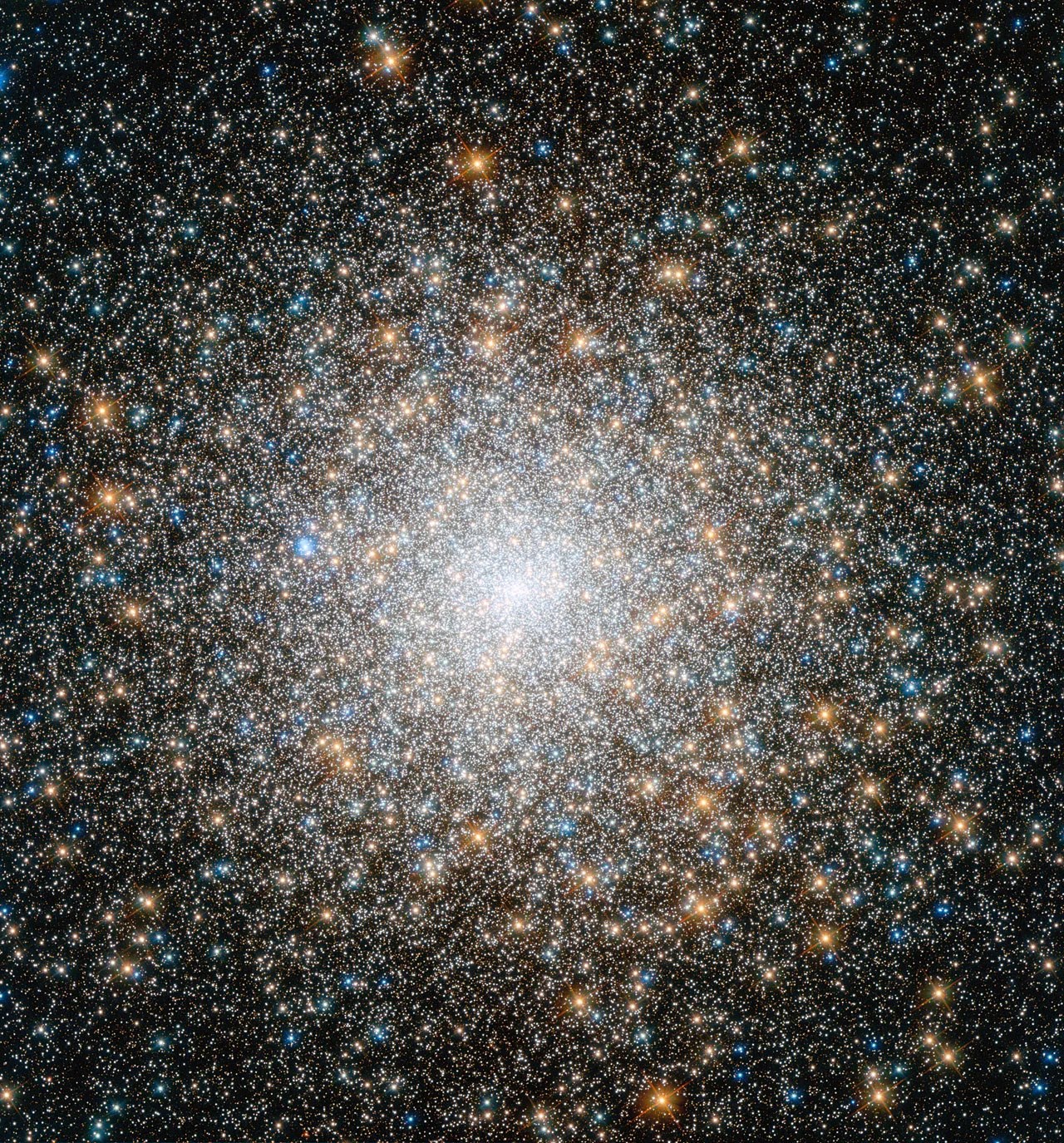 A dense globular cluster of thousands of stars.