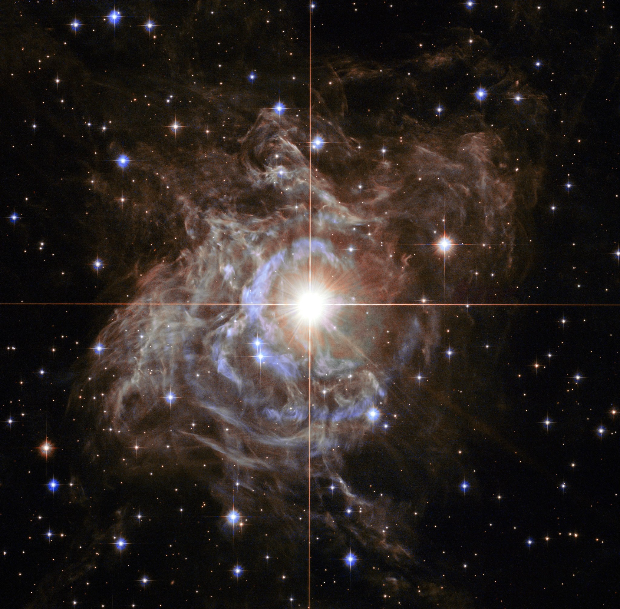 Bright star amid swirls of light