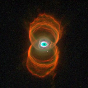 Multiple orange rings of light form a figure eight around an eye-shaped greenish center.
