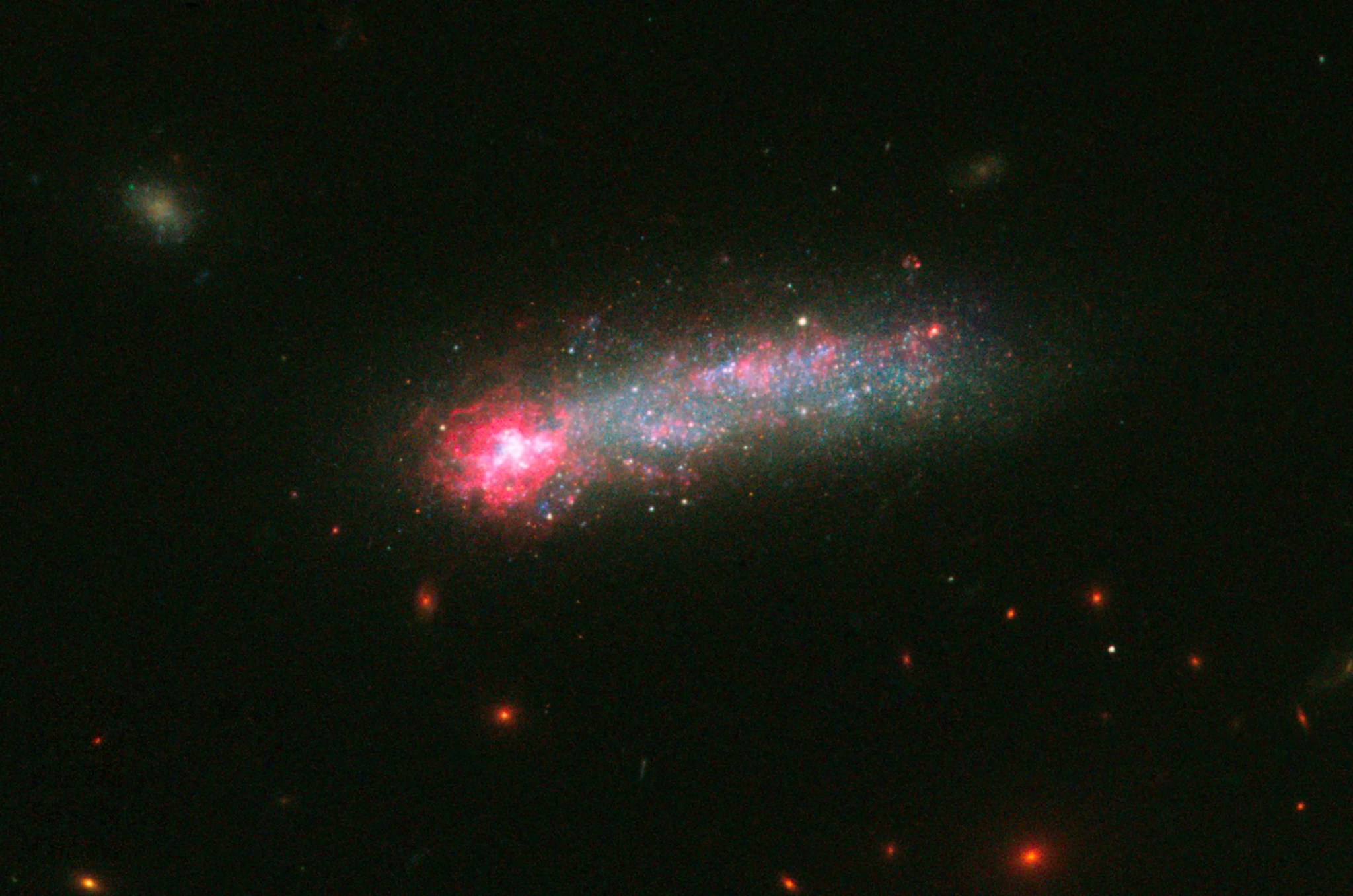 Star birth lights up a small galaxy