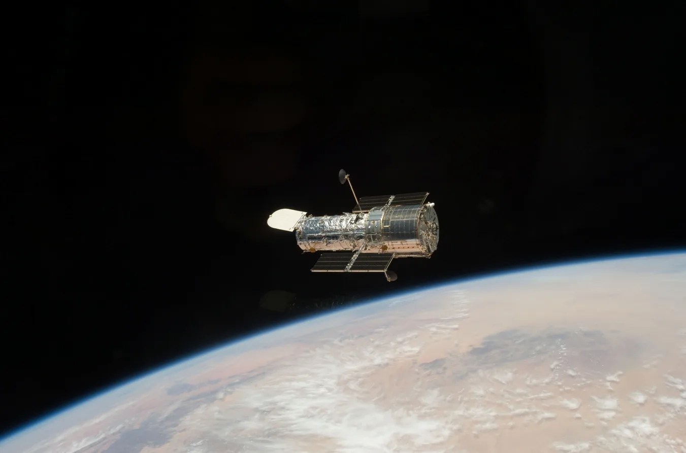 Hubble space telescope over Earth