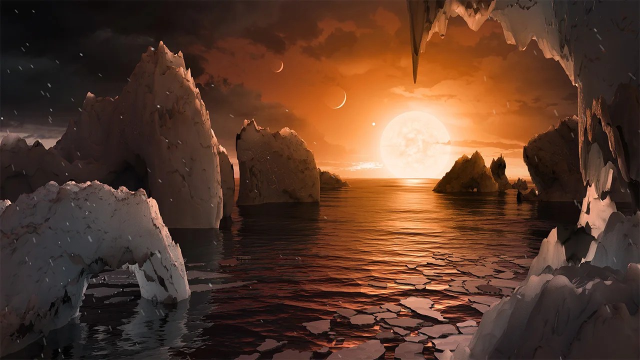 jagged outcrops emerge from a liquid ocean, a white-orange glow from a setting star at center right. 3 other planets are in the sky trailing off to the upper left from the setting star