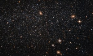 A field of stars against black space fills the image, making up the dwarf galaxy Leo A.