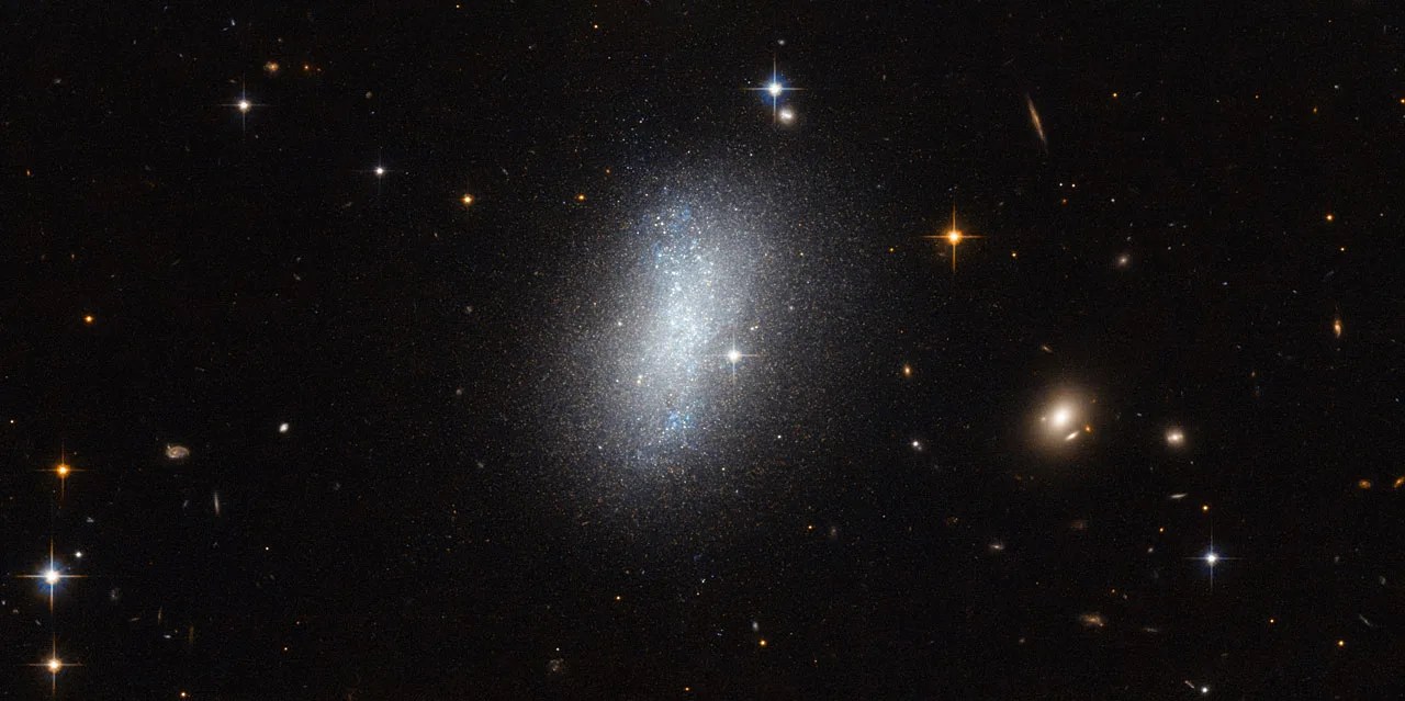 A bright elliptical galaxy on a field of stars