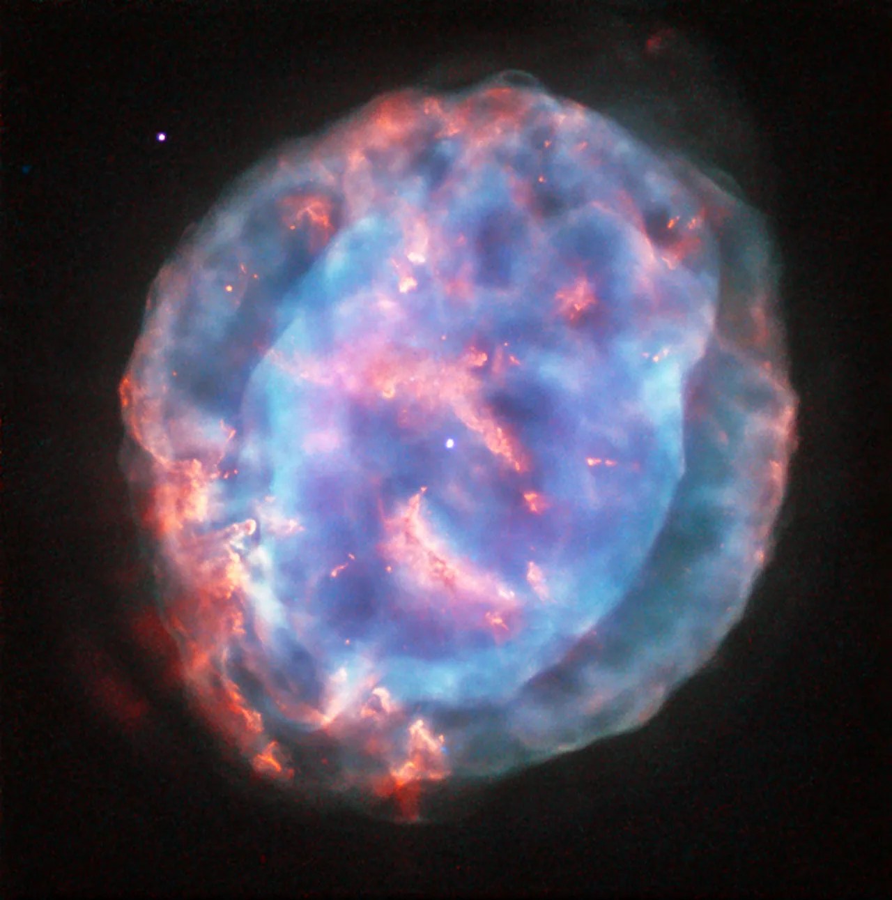 The colorful bubble against the black sky is planetary nebula ngc 6818