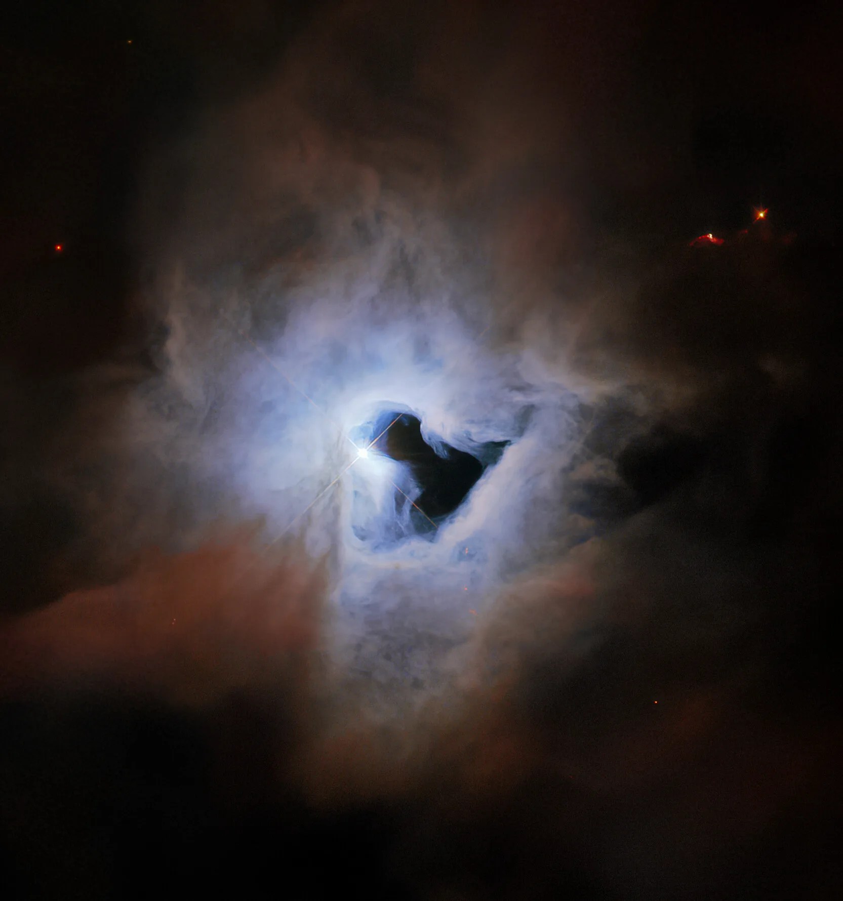Bright blue-white cloud with a black keyhole-shaped void in the middle. edge of the blue-white cloud transitions to brownish-rusty colored cloud.